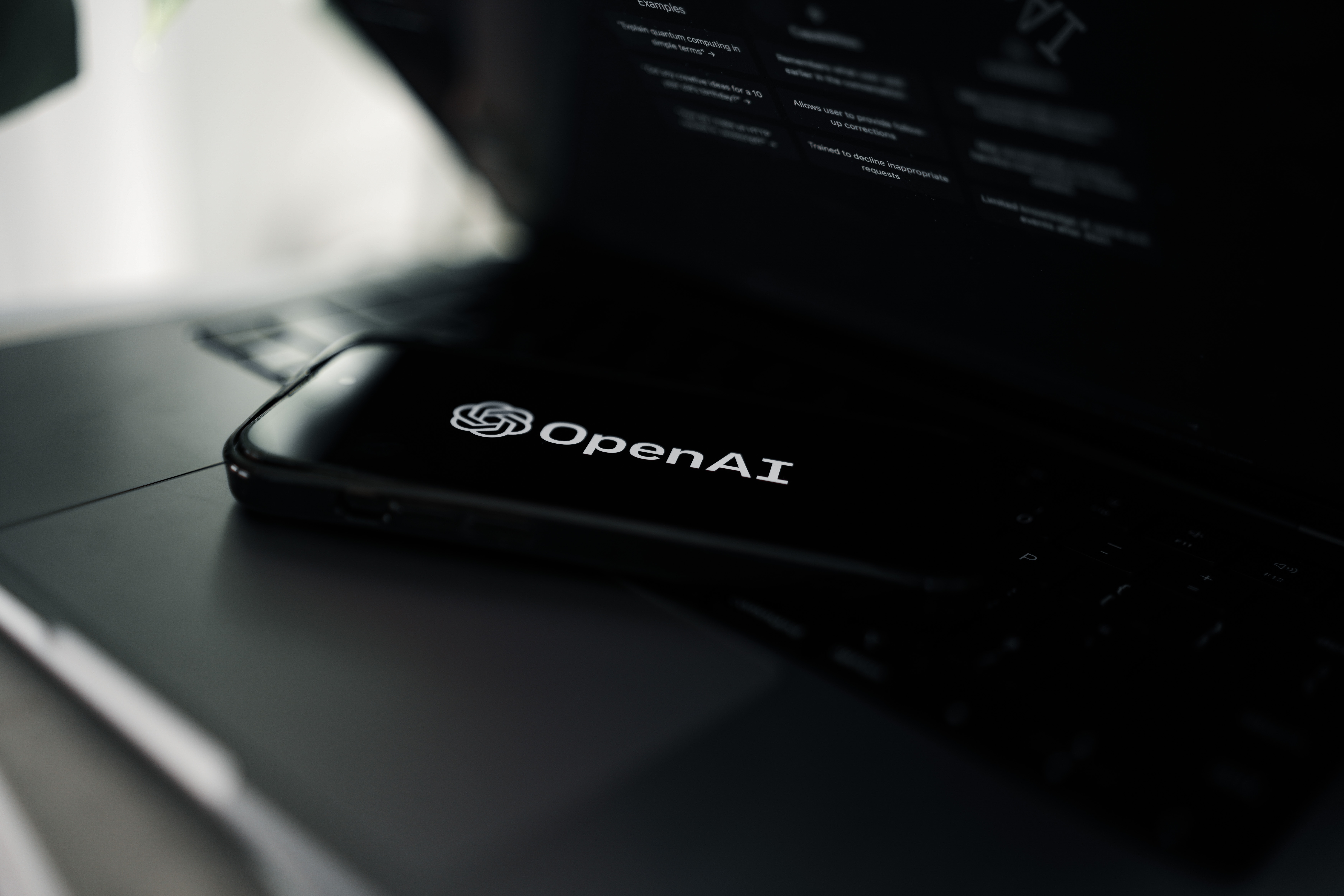 Open AI logo on device.
